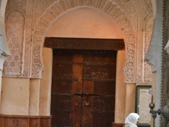 Woman walking through the old city in Fes